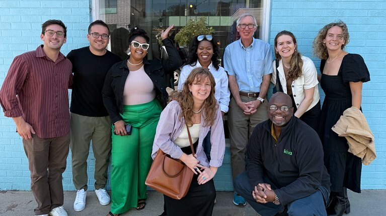 Emma Moriarty (far right, in black) with Kiva U.S. staff and partners at an offsite in Denver, CO