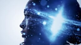 A profile of a woman with her hand up to her chin in a thoughtful pose. A galaxy bursting with light is superimposed over profile, centered over her mind.