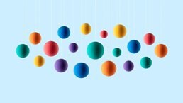 Rainbow colored spheres hanging on strings